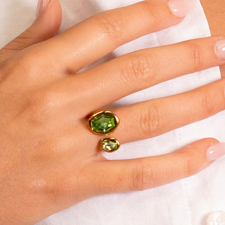 Flora Green Zircon Ring 18k gold green zircon open band adjustable ring close up on hand

