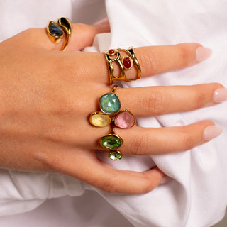 Flora Green Zircon Ring 18k gold green zircon ring styled with Island Collection gold rings
