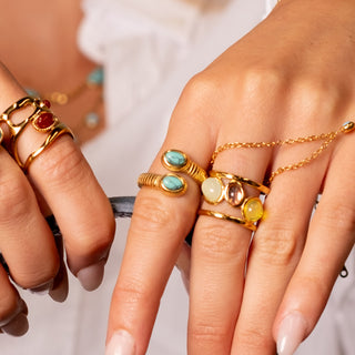Ios Turquoise Snake Ring 18k gold natural turquoise snake ring styled with colourful gold rings
