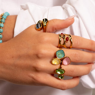 Isola Gem Ring 18k gold abalone shell ring styled with Island Collection gold rings

