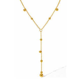Leah Drop V Necklace 18k gold PVD beaded lariat Y-drop necklace on white background