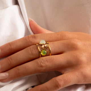 Monte Gem Ring 18k gold multi-colour stone wide band adjustable ring close up on finger
