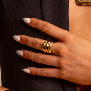 Olympia Band Ring 18k gold sculptural band ring stacked and styled with Apollo Collection gold jewellery
