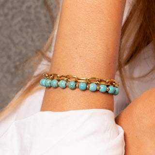 Rhodes Turquoise Bracelet Set 18k gold natural turquoise beaded and chunky chain bracelet set close up on wrist